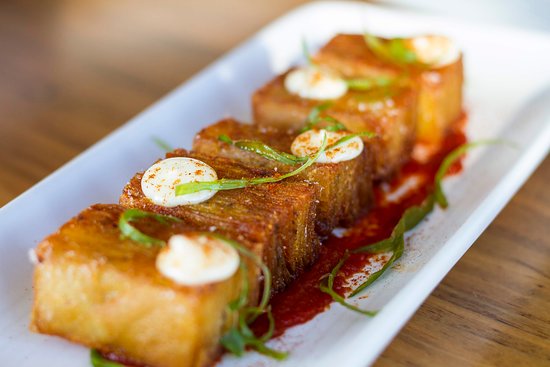 Loquita signature dishes Patatas BravasGambas al AjilloPan Con Tomate